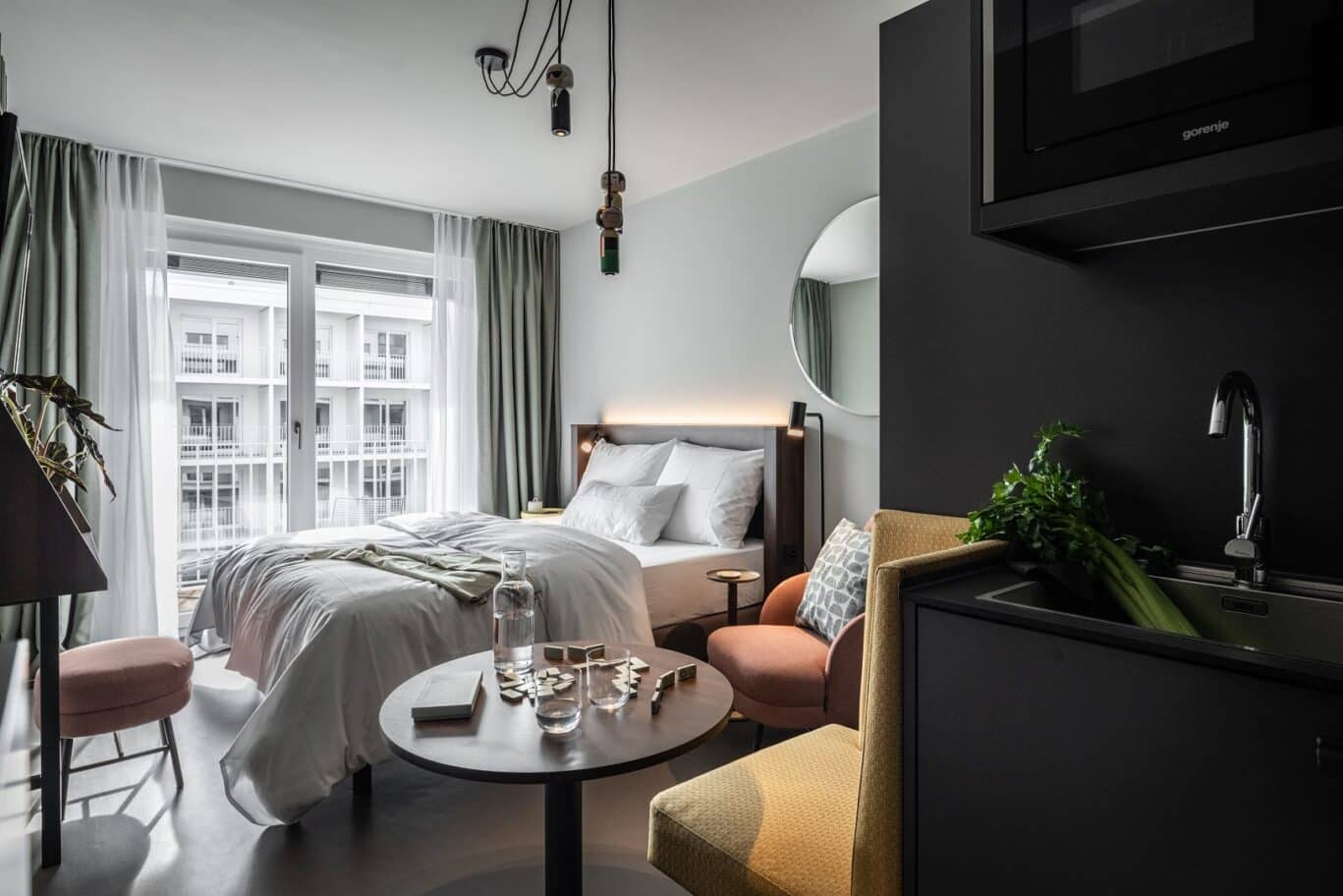 Room With Kitchen And Bed